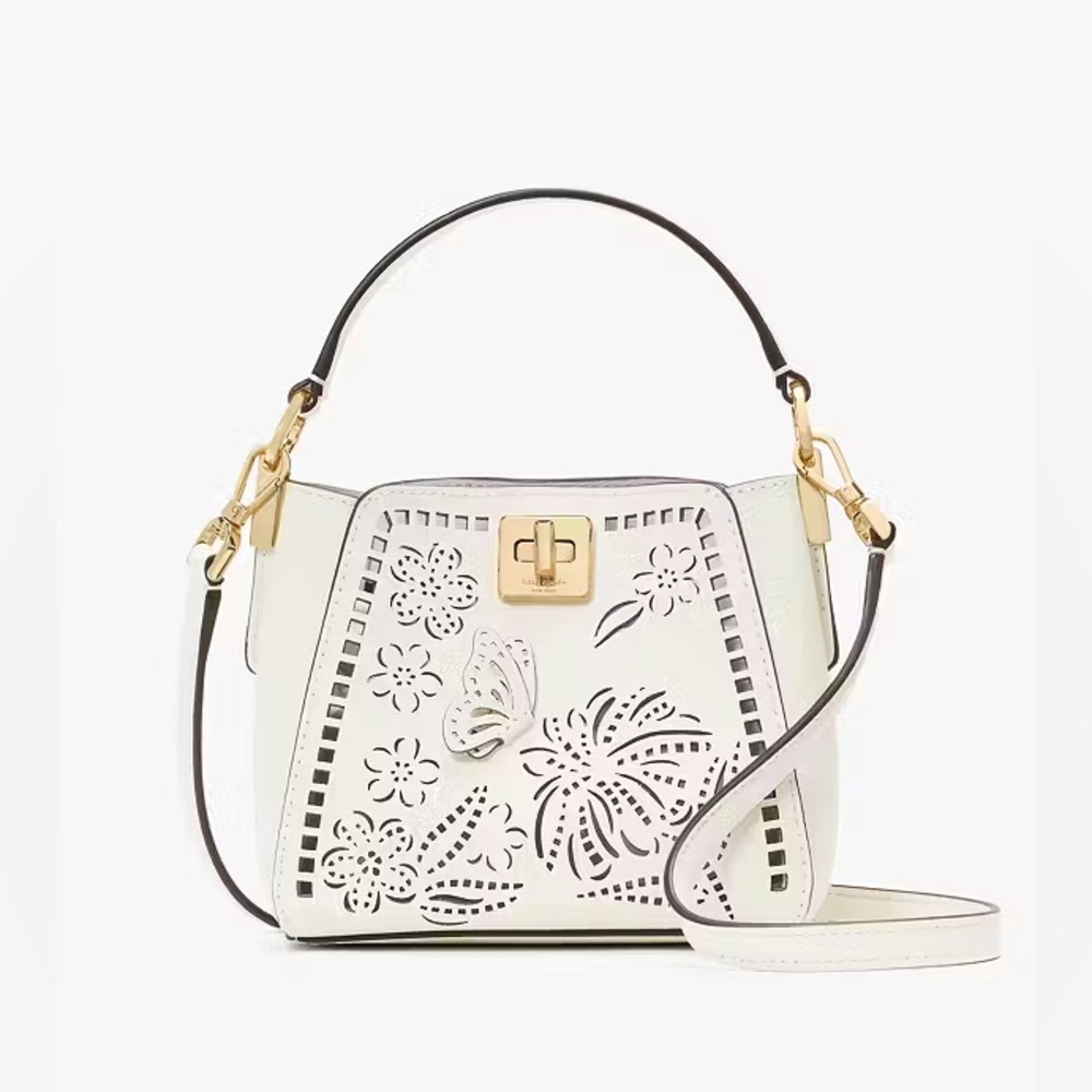 Kate Spade “Phoebe” ivory perforated leather mini crossbody satchel bag purse